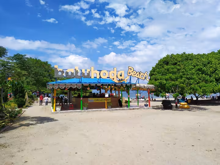 Sejarah Pantai Batu Hoda Tigaras